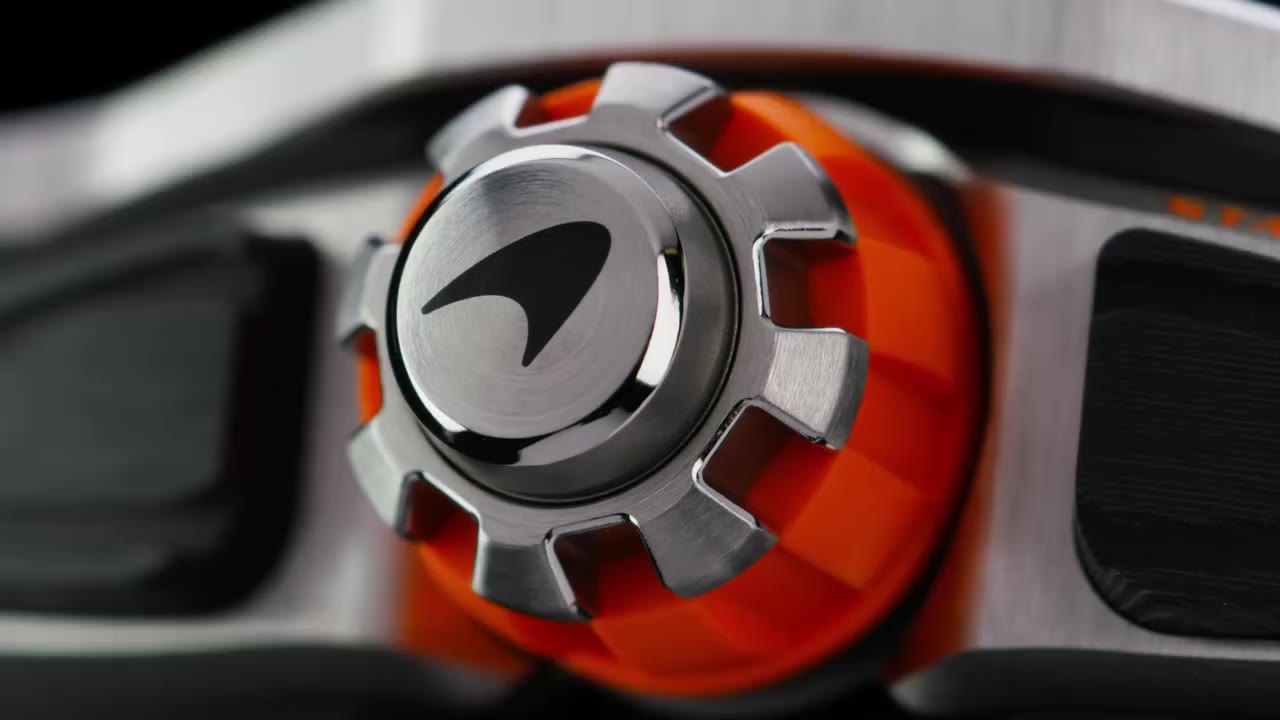 McLaren badge detail under controlled specular light