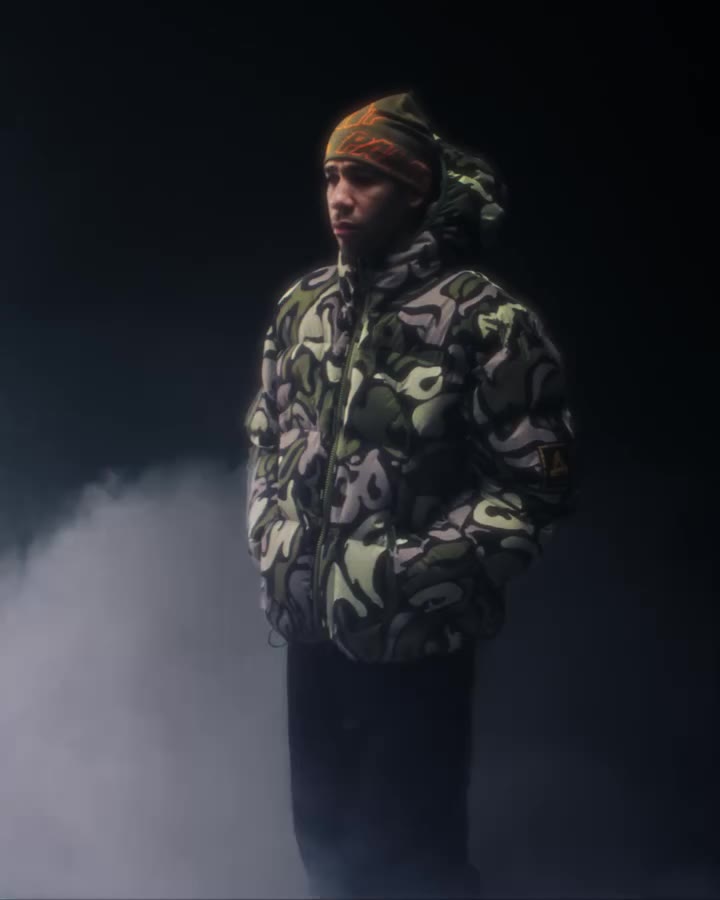 Maharishi camo jacket under moody key light